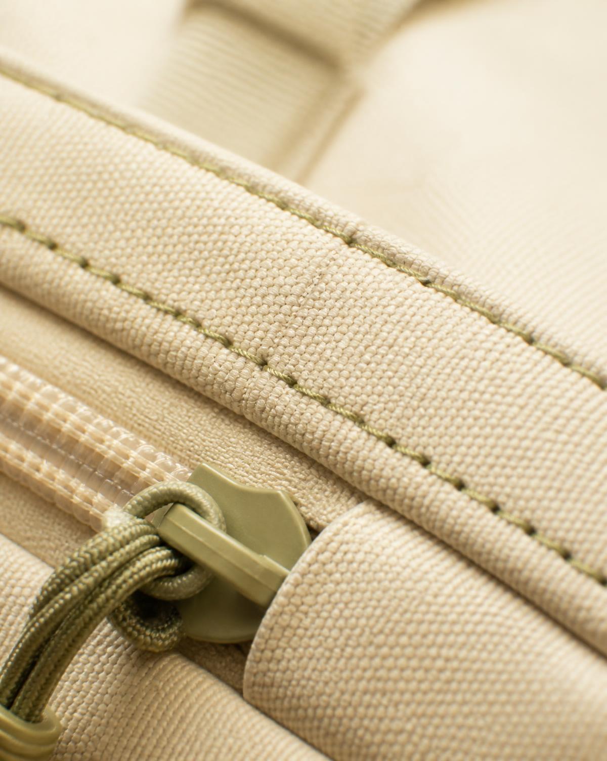 Close-up of premium home textile packaging material, stitching and zipper finishing